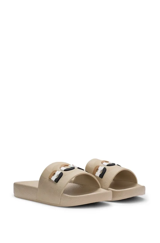 Kids’ slides with signature-stripe logo Kids’ slides with signature-stripe logo