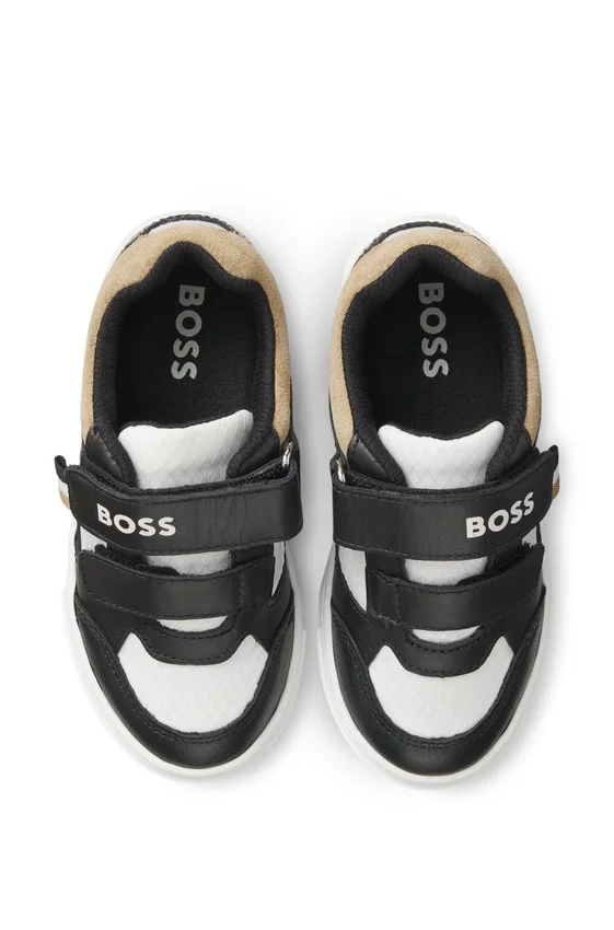 Kids’ sneakers in leather and canvas Kids’ sneakers in leather and canvas