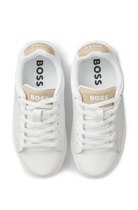 Kids’ sneakers in monogram-embossed leather Kids’ sneakers in monogram-embossed leather