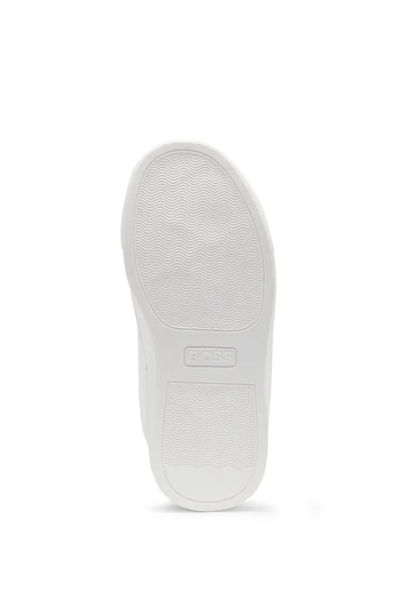 Kids’ sneakers in monogram-embossed leather Kids’ sneakers in monogram-embossed leather