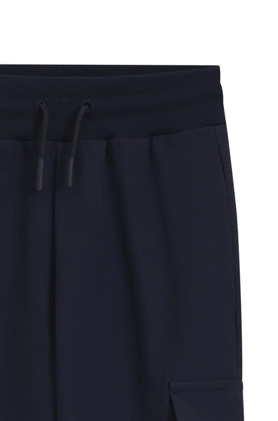 Kids’ sweatpants with cargo pockets Kids’ sweatpants with cargo pockets