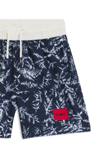 Kids’ swim shorts with allover print