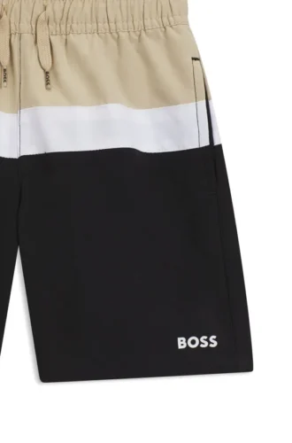 Kids’ swim shorts with color-blocking