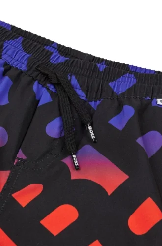 Kids’ swim shorts with gradient monogram print