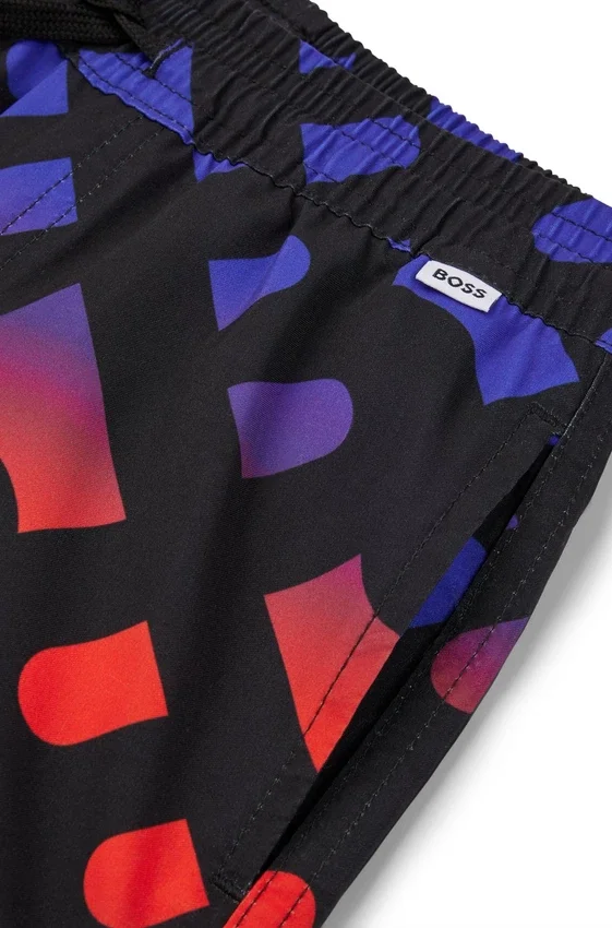 Kids’ swim shorts with gradient monogram print Kids’ swim shorts with gradient monogram print