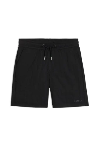 Kids’ swim shorts with logo print