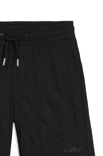 Kids’ swim shorts with logo print