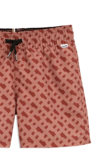 Kids’ swim shorts with monogram print