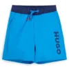 Kids’ swim shorts with vertical logo print