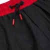 Kids’ swim shorts with vertical logo print