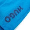 Kids’ swim shorts with vertical logo print