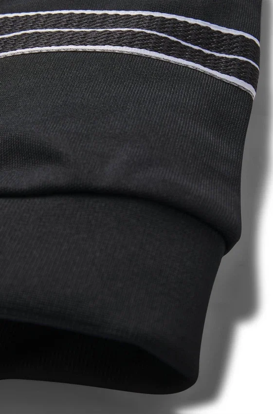 Kids’ tapered-fit tracksuit bottoms with herringbone trims Kids’ tapered-fit tracksuit bottoms with herringbone trims