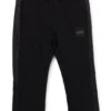 Kids’ tracksuit bottoms with monogram inserts Kids’ tracksuit bottoms with monogram inserts