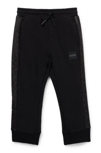 Kids’ tracksuit bottoms with monogram inserts