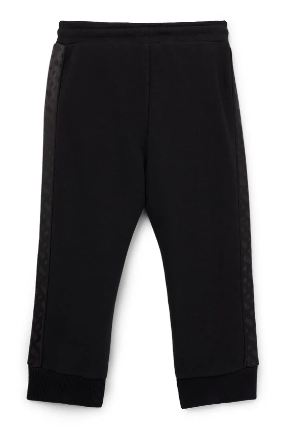 Kids’ tracksuit bottoms with monogram inserts Kids’ tracksuit bottoms with monogram inserts