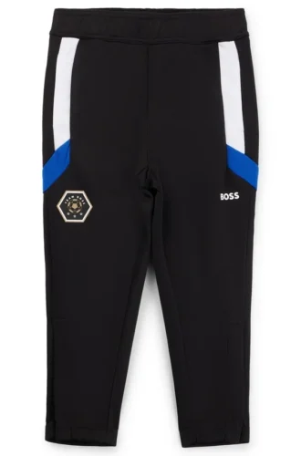 Kids’ tracksuit bottoms with stripes and logo details