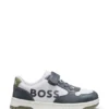 Kids’ trainers in leather and canvas Kids’ trainers in leather and canvas