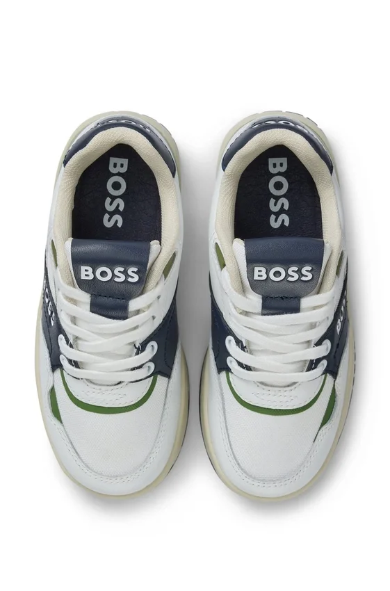 Kids’ trainers in leather and canvas Kids’ trainers in leather and canvas