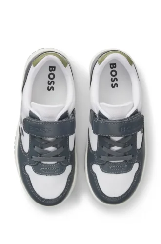 Kids’ trainers in leather and canvas