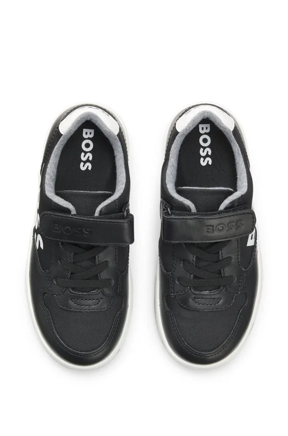 Kids’ trainers in leather and canvas Kids’ trainers in leather and canvas