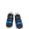 Kids’ trainers in leather with branded touch-closure straps