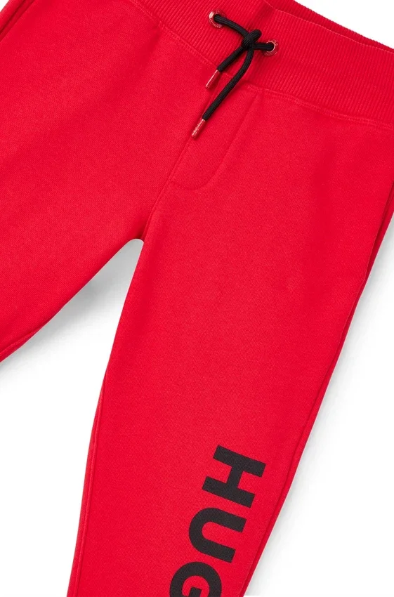 Kids’ vertical-logo tracksuit bottoms in a cotton blend Kids’ vertical-logo tracksuit bottoms in a cotton blend