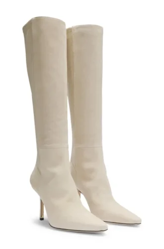 Knee boots in leather and suede
