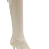 Knee boots in leather and suede