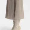 Knee boots in leather and suede