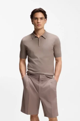 Knit polo sweater with covered placket
