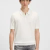 Knit polo sweater with covered placket