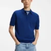 Knit polo sweater with covered placket