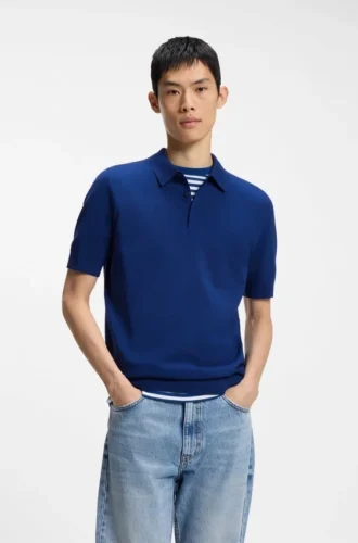 Knit polo sweater with covered placket