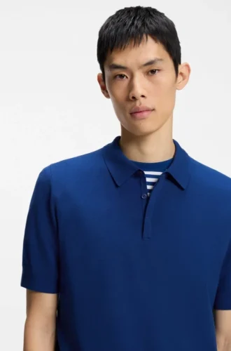 Knit polo sweater with covered placket
