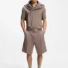 Knit polo sweater with covered placket