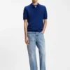 Knit polo sweater with covered placket