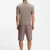 Knit polo sweater with covered placket