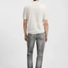 Knit polo sweater with covered placket