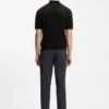 Knit polo sweater with covered placket