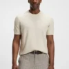 Knit sweater with mixed structures