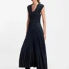 Knitted dress with plissé skirt part