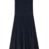 Knitted dress with plissé skirt part