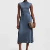 Knitted dress with satin skirt Knitted dress with satin skirt