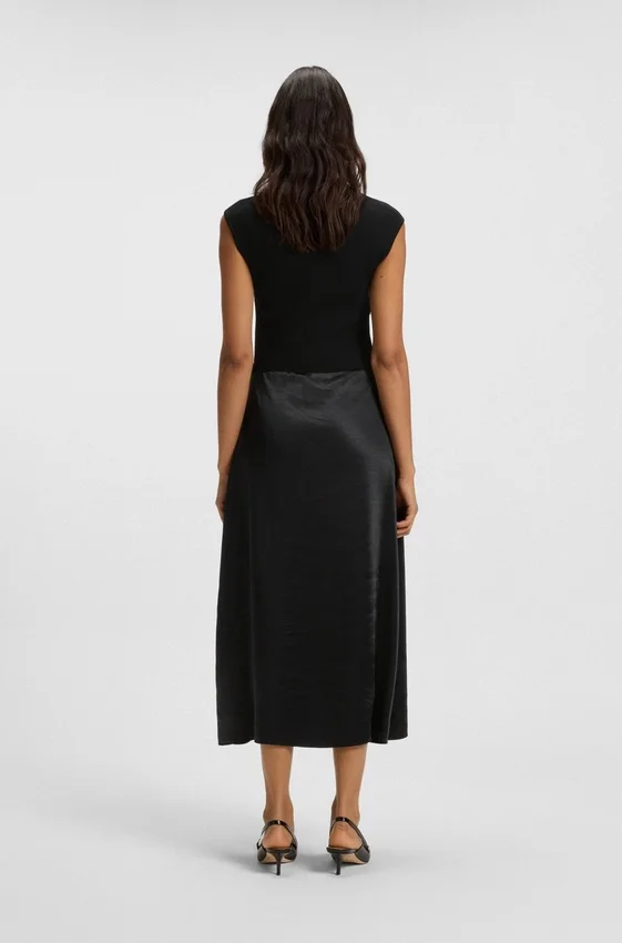 Knitted dress with satin skirt Knitted dress with satin skirt