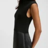 Knitted dress with satin skirt Knitted dress with satin skirt