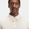 Knitted polo sweater in virgin wool