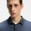 Knitted polo sweater in virgin wool