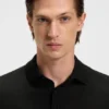 Knitted polo sweater in virgin wool