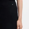 Knitted skirt with logo charm