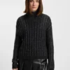 Knitted sweater with bold ribbed structure